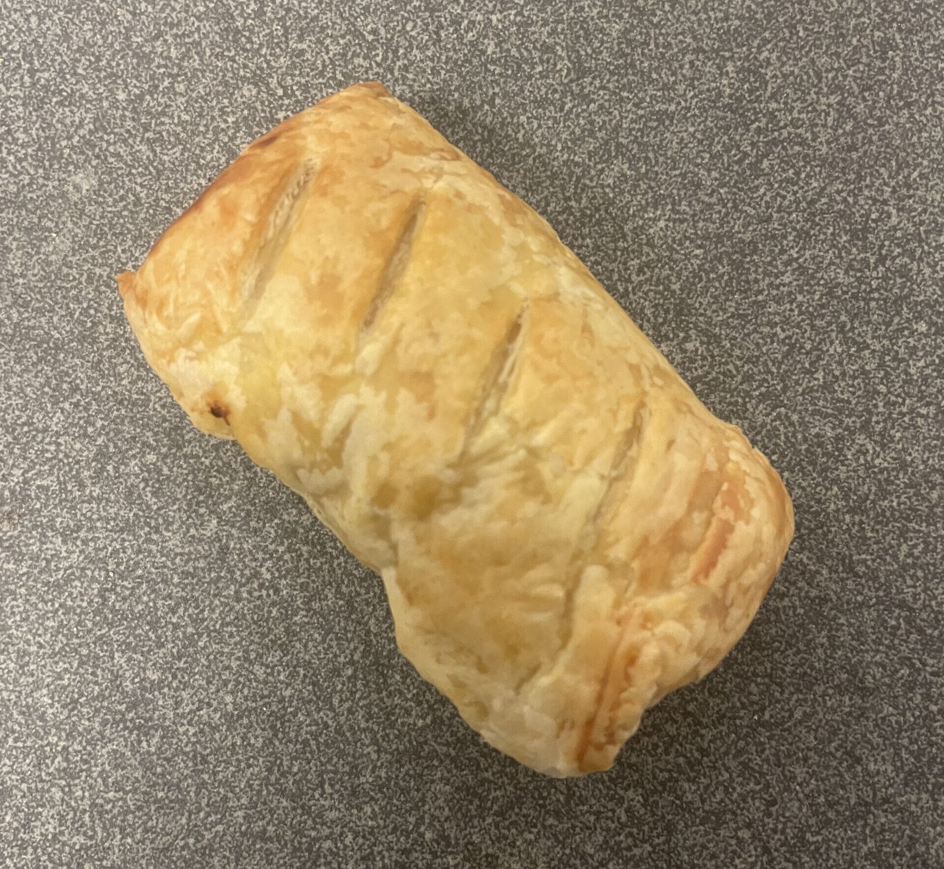 4 Hand Made Bake Yourself Sausage rolls ( with caramalised onoin)